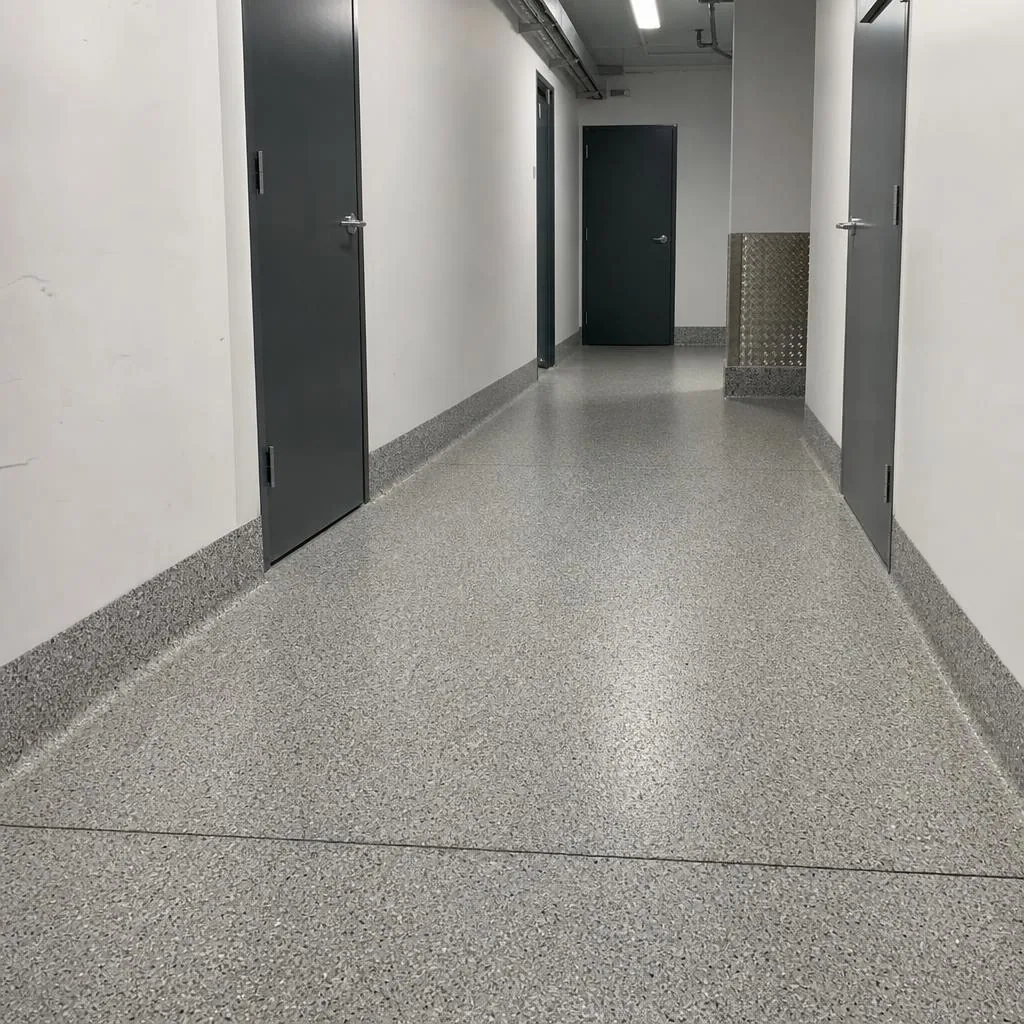 Illustrative textured grey quartz broadcast epoxy commercial floor